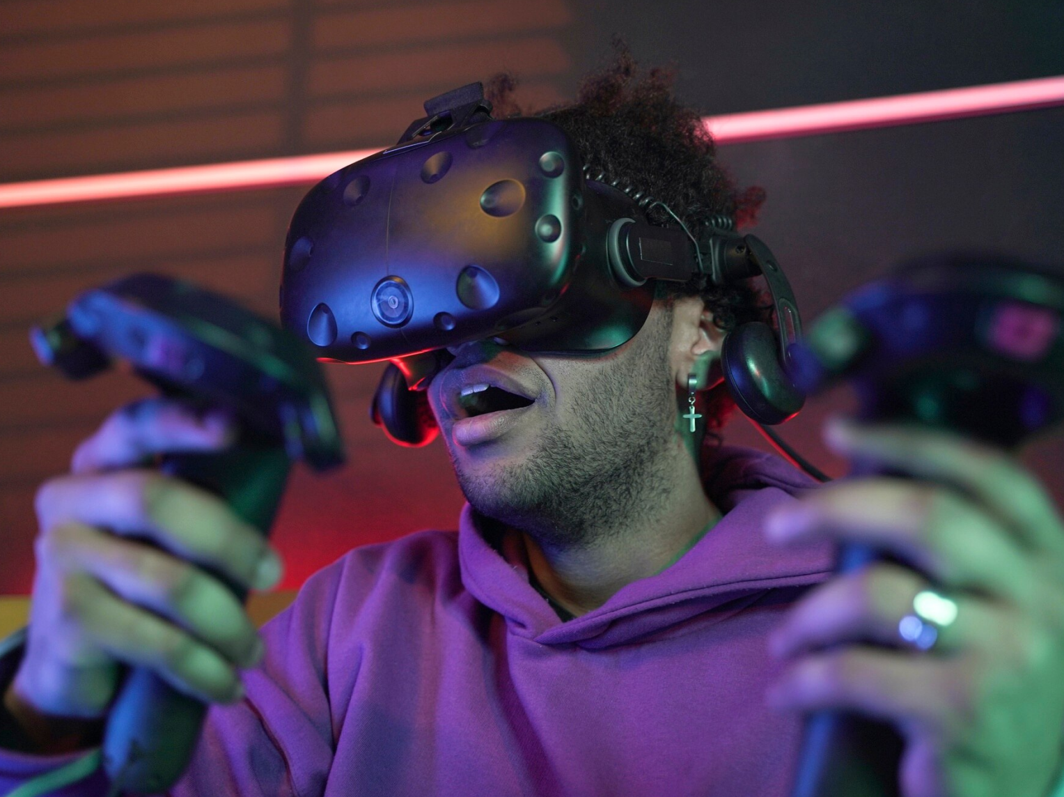 Person plays Web3 game with AR headset